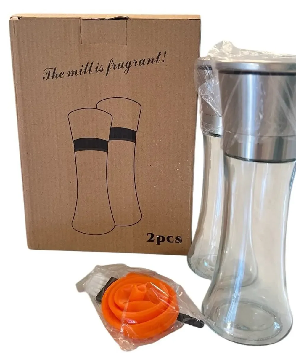 Salt & Pepper Grinder Set NEW IN BOX Clear Glass Containers Silver Top
